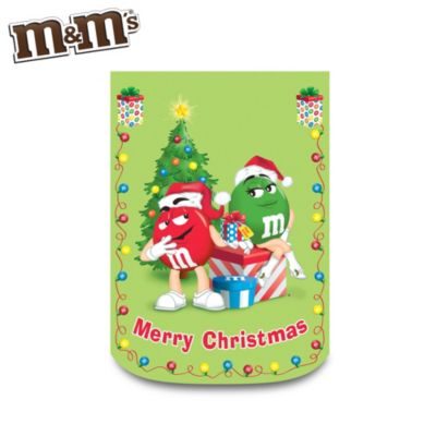 Any time is a good time to share your love of chocolate and now you can celebrate each holiday in delicious style with this first-ever M&M'S&reg; decorative flag collection! Exclusively from The Hamilton Collection, your M&M'S characters flag collection begins with Issue One, Merry Christmas. Soon, your collection will continue with Issue Two, Happy New Year, and additional M&M'S decorative holiday flags, each a separate issue to follow.You'll add some colorful chocolate fun to your neighborhood every season as you display flags for every holiday such as Christmas, Halloween, The 4th of July and more! Each flag features M&M'S characters dressed in seasonal garb and is decorated with eye-catching seasonal details. Plus, each issue of the playful seasonal home decor in this collection is constructed of waterproof, fade-resistant polyester and is machine washable for years of quality usage. But hurry - this collection could disappear like M&M'S candies from a bowl. Strong demand is expected - order now!