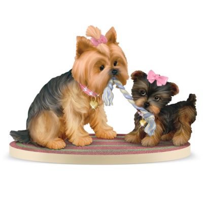 The playful mischief between a Yorkie mother and her feisty pup is about as endearing a scene as one can witness. Now, you can experience those precious and heartwarming moments over and over again with the My Darling Little Pup Yorkie Figurines Collection, exclusively from The Hamilton Collection. Feast your eyes on the most adorable canine connection beginning with Issue One, You Tug On My Heartstrings. Soon your collection will continue with Issue Two, You Always Brighten My Day, Issue Three, You Give The Best Snuggles, and additional Yorkie figurines, each a separate issue to follow.Perfect for Yorkie lovers and an ideal way to celebrate motherly love, each Yorkie figurine in this collection is exquisitely handcrafted in artist's resin to create a dazzling doggie duo. With meticulous hand-painting, to bring out lifelike details, this limited-edition collection will charm you with accents of pearlescent bows and collars, sparkling faux gems, and shiny, gold-toned heart-shaped tags. Make great additions to your own collection or Yorkshire Terrier gifts for family and friends. Don't miss a single issue - order now!