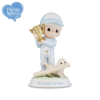 Pay tribute to a loving relationship that bridges the generations with an enchanting collectible Precious Moments&reg; grandson figurine collection, capturing the innocent wonder of artist Sam Butcher's much-loved characters. Your collection begins with Issue One, My Grandson, My Champ. Soon, your collection continues with Issue Two and additional collectible Precious Moments grandson figurines, each a separate issue to follow.‡Exclusively from The Hamilton Collection, these delightful Precious Moments collectibles celebrate a grandson - the sweetest gift of all! Each of the limited-edition grandson figurines in this collection is skillfully handcrafted of fine bisque porcelain and masterfully hand-painted in soft pastel hues to capture details like the boys' endearing expressions and signature teardrop-shaped eyes. But hurry! These loving lads are sure to steal hearts everywhere. Heavy demand is expected, and you won't want to miss out. Order now!