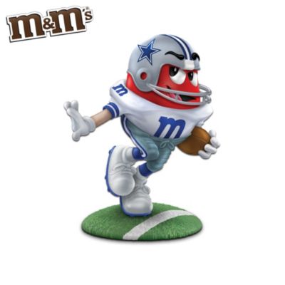 Proving that great American winners never crack under pressure, the beloved M&M'S&reg; Brand characters are hitting the gridiron in a first-ever tribute to the legendary Dallas Cowboys. Introducing Victory is Sweet - a limited-edition football figurine collection, available exclusively from The Hamilton Collection. Sporting authentic-looking uniforms, these unique Dallas Cowboys figurines are going for goal beginning with Issue One, Tearing Up the Turf, starring M&M'S Brand Red. Soon, your collection will continue with Issue Two, One Sweet Blocker, starring Yellow, and Issue Three, Blue 42 Hut Hut Hike, starring Blue. Additional M&M'S Brand football figurines, each a separate issue, will follow.Officially licensed by M&M'S Brand and NFL Properties LLC, each Dallas Cowboys figurine in this collection is meticulously handcrafted of artist's resin to capture all the thrill and excitement that America's team brings to the game of football. Strong demand is expected for this sweet salute, so don't wait to score yours! Editions are limited to only 95 castings days - order now!