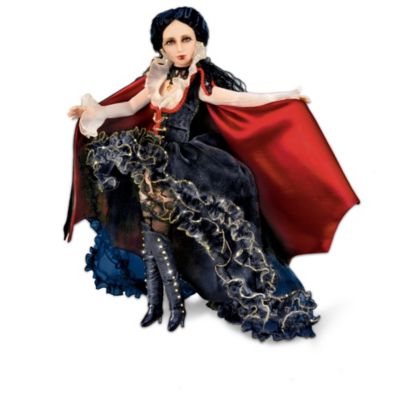 For years, the vampire princess has masked her dual identity from all who know her, but it's her turn for a surprise as she reunites with her unknown twin sister. Now, you can celebrate this bewitching legend with this first-of-a-kind vampire doll collection, each fully poseable with 14 points of articulation, beginning with Issue One, Delphine. Your collection will be complete with Issue Two, Darcia, each issue arrives separately.Exclusively from The Ashton-Drake Galleries, each Gothic vampire girl in this collection is exquisitely handcrafted in vinyl, meticulously hand-painted and includes two interchangeable magnetic faceplates turning each doll from a temptress into a vampire. Each issue's extravagant ensemble allows for a seductive or mysterious vampire from an elaborate, black gown; bodice edged in braided, red trim; corset accented with dangling golden chains; high collar; lace; flamenco-style skirt with gold-edged ruffles; removable vampire cape and more! Strong demand is expected. Order now!