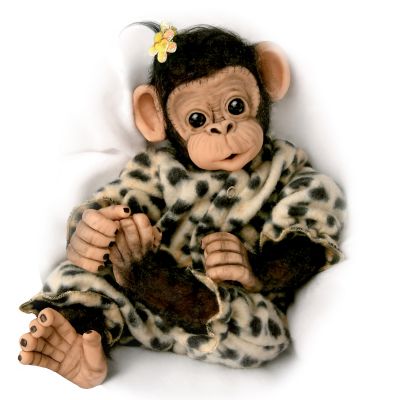 Do you find animal babies to be irresistibly appealing? Now you can adopt a whole collection of adorable chimpanzee baby dolls as your very own - and also help wildlife worldwide, because a portion of the proceeds will be donated to preserve animal life and the Earth's resources. These are the first ever Ashton-Drake lifelike chimpanzee baby dolls by Master Artist Cindy Sales. And each baby chimp even comes with an Adoption Certificate that you can fill out yourself! Start your collection with Issue One, Little Ubu. Soon your collection continues with Issue Two, Baby Binti, Issue Three, Sweet Mashaka, and additional collectible chimpanzee baby dolls, each a separate issue to follow.You'll be delighted at every realistic feature in these chimpanzee dolls, handcrafted of collector-quality vinyl and hand-painted to capture every detail, right down to the creases and folds in their hands and feet! They have soft bodies and moveable limbs for many posing options. Little wisps of hair, applied by hand, add to the realism of this adorable chimpanzee doll collection. When their luminous brown eyes look into yours, who could resist these simian sweethearts? And each one arrives ready to be cuddled in a one-piece sleeper in a different animal-print pattern. Strong demand is expected for this baby chimpanzee doll collection, each more cuddly than the next. Don't wait; order now!