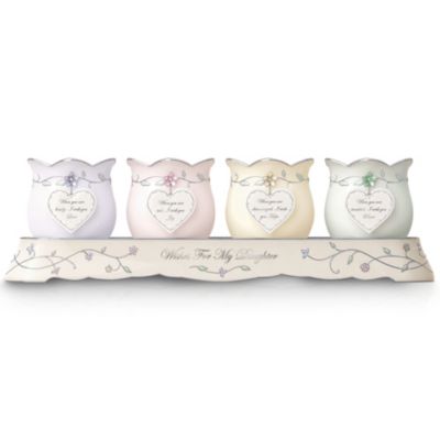 Your daughter is the light of your life, bringing so much joy and love with all she does. Now, you can light up her days with a musical porcelain candleholder daughter gift that celebrates all your hopes and dreams for her shining future. Let your daughter know your heartfelt wishes for her with this beautiful collection inspired by the treasured words of Jerry Knoll's "I Wish You" poem. Each candleholder edition bears tender message beginning with Issue One, Love. Soon after, your daughter will be delighted to receive Issue Two, Joy. Later, her collection will be enhanced by Issue Three, the "Wishes for My Daughter" musical display stand and additional candleholders, each a separate issue to follow.Available only from Ardleigh Elliott, this "I Wish You" porcelain candleholder daughter gift features fluted votive holders crafted of precious Heirloom Porcelain&reg; and richly adorned with gleaming platinum and sparkling Swarovski&reg; crystal details. Each edition in the collection brings its own special blessing held within a jeweled porcelain heart that dangles from a raised-relief flower accent. Included is the musical display tray that beautifully brings the collection together with embellishments of simulated jewels and sparkling Swarovski crystals. It even plays the melody of "You Light Up My Life" for the perfect finishing touch. Hurry to surprise your daughter with this unforgettable gift. Strong demand is expected, so order now! California Residents click here for Proposition 65 notice.