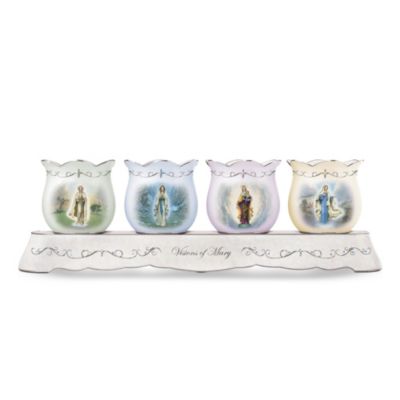 Grace your home with this special collection of votive candleholders with inspirational art of the Blessed Virgin. Four beautiful candleholders showcase the luminous Renaissance-style work of acclaimed artist Hector Garrido, starting with Issue One, Our Lady of Lourdes. Next, experience the moving beauty of Issue Two, Our Lady of Fatima. Before long, your beautiful collection will continue with Issue Three, the musical display stand and additional candleholders, each a separate issue to follow.This limited-edition inspirational home decor is crafted of precious Heirloom Porcelain&reg;. Each issue in the collection features ornate platinum-finished scrollwork and is richly adorned with sparkling hand-set Swarovski&reg; crystals and simulated gems. The lovely musical display stand plays the uplifting tune of "Ave Maria." It's a lovely way to illuminate your own faith, or makes a unique inspirational gift, but hurry! Strong demand is expected - order now!California Residents click here for Proposition 65 notice.