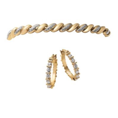 Juego de aretes de argolla y brazalete de dos tonos