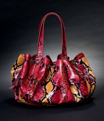 MULTI-GROMMET SATCHEL