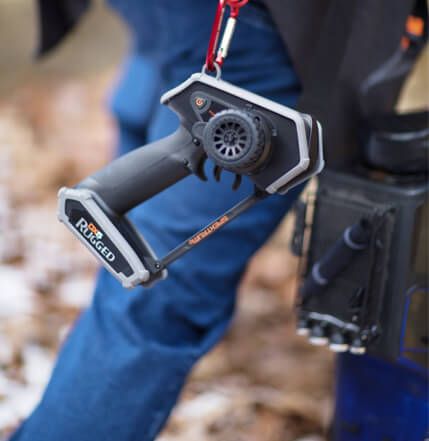 DX5 hanging from a belt