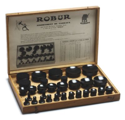 Used Set of 35 Plastic/Bakelite Dies In Wooden Case
