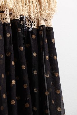 black dress with gold polka dots