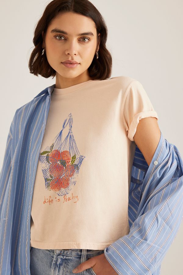 Vista diapositiva: 1: T-shirt Grafica Baby Peachy di Anthropologie