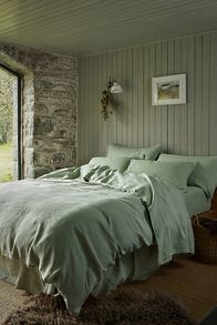 Slide View: 1: Piglet In Bed Sage Green Linen Duvet Cover