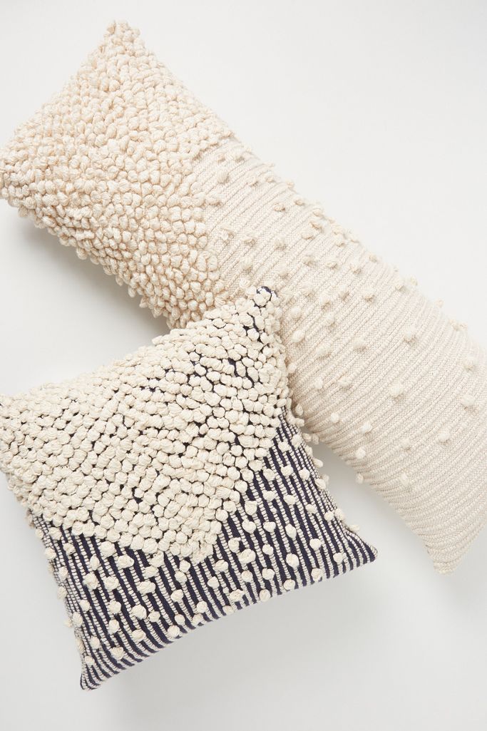 Textured Bobble throw pillows at Anthropologie bring a Moroccan flavor to a range of living room styles from French to Boho to Modern. #pillows #moroccanpillows #homedecor #nubbytexture #bohostyle #neutraldecor #livingroom