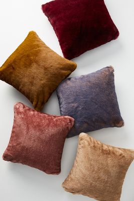 round purple throw pillow