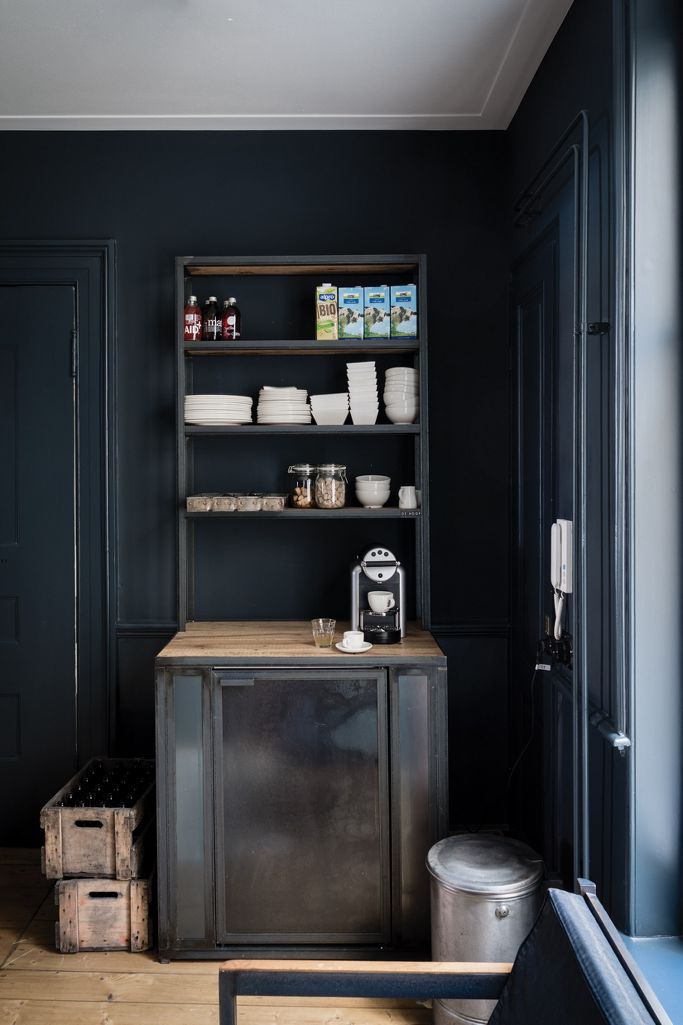 Railings by Farrow & Ball is a dramatic blue-black paint color in a beverage station area. #farrowandball #railings #blueblack #blackpaintcolors #paintcolors