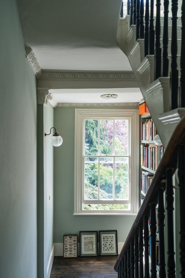 Farrow & Ball Blue Gray No.91 paint color on walls of a landing in a traditional home.