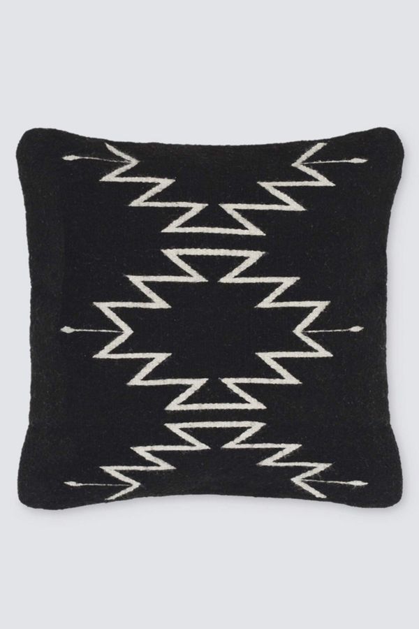 Inspired by Zapotec patterns from Mexico’s Oaxaca region, the black and cream color combination brings a modern look to these native designs. This pillow is handwoven using sheep’s wool from the local community. From start to finish, each one takes three days to complete! You'll love this Citizenry Tobala Pillow for boho artisan global style!