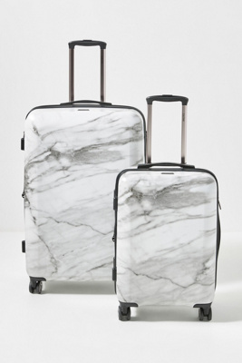 calpak white luggage