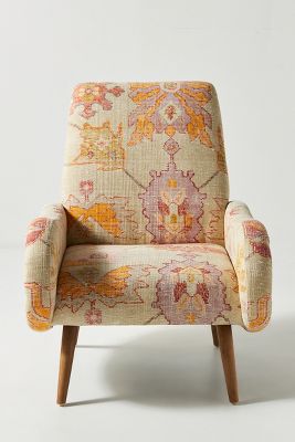 yellow patterned armchair