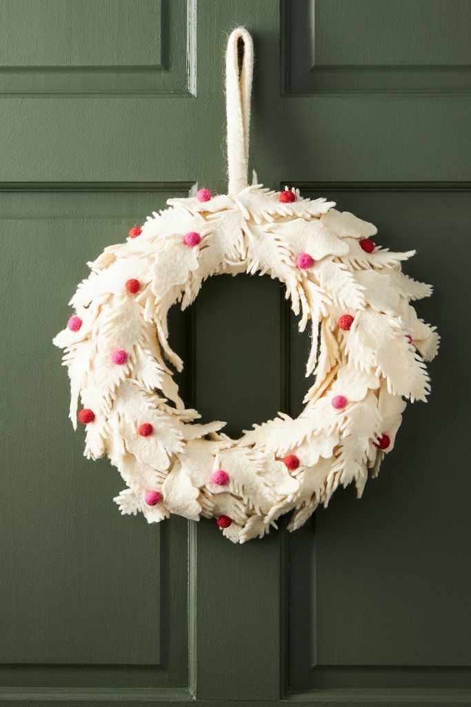 Berry Leaf Wreath with ivory felt leaves and pink and red berries - Anthropologie. #christmaswreath #shabbychic