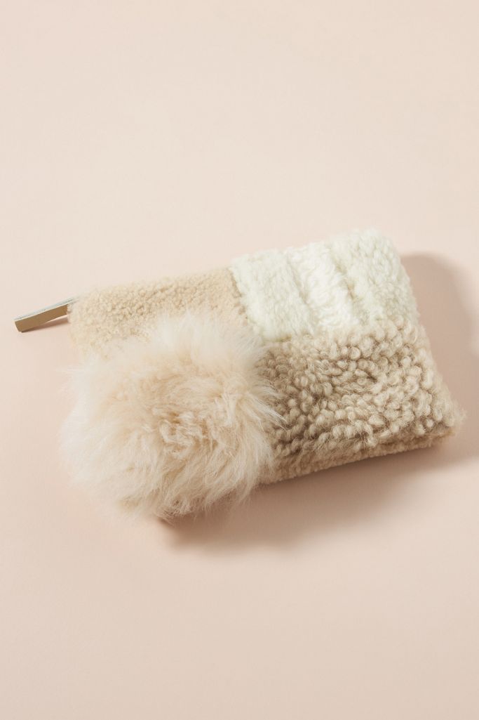 Patchwork shearling clutch - a cozy bag from Anthropologie.