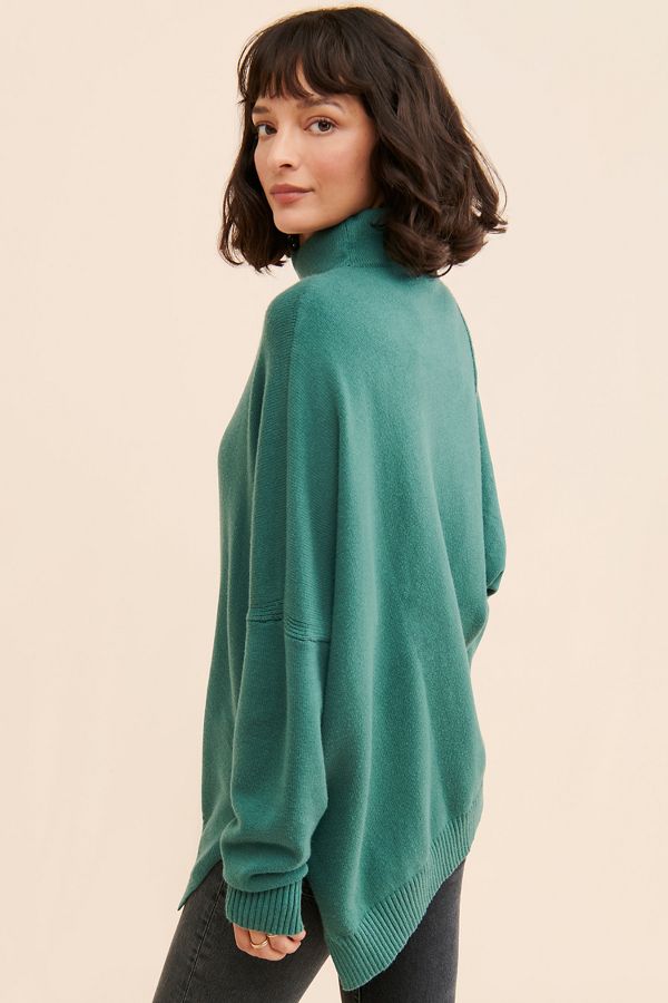 Slide View: 2: Flat White Asymmetrical Hem Turtleneck Sweater