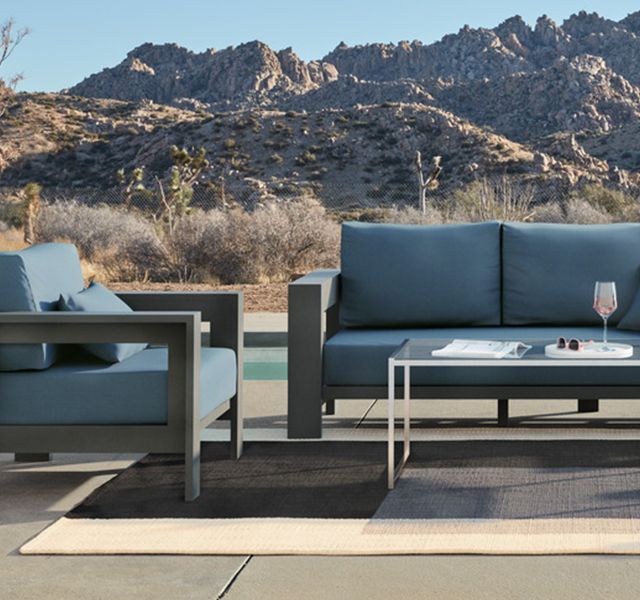 walker outdoor metal sofa with sapphire sunbrella cushions