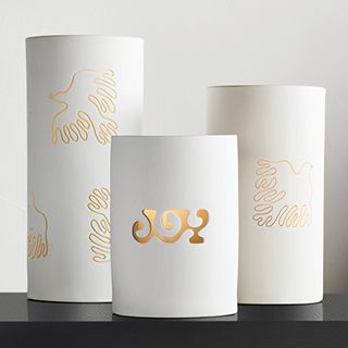 white ceramic hurricane candle holders