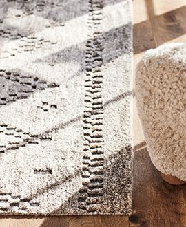 up to 50% off select rugs