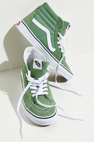 green and white high top vans