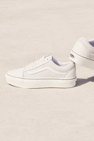 white snakeskin platform vans