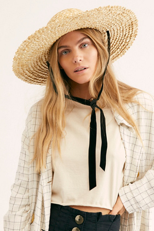 straw hat with ribbon chin tie