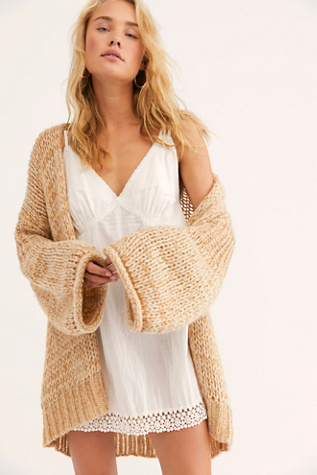 Shop our Home Town Cardi at FreePeople.com. 
