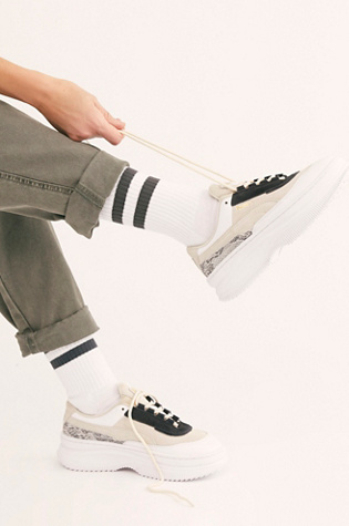 deva reptile sneakers