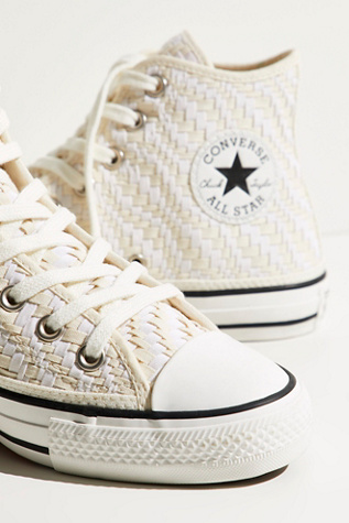 chuck taylor all star woven low top