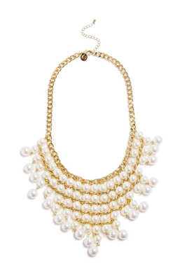 Give your look extra glam with this standout statement necklace. Faux ...