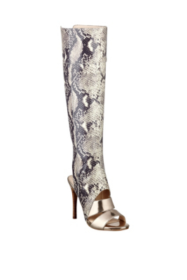 Sexy and daring, we just gave the knee-high boot a whole new look. Skin ...