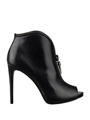 Sexy ankle booties get a rocker-inspired update with this zipper ...