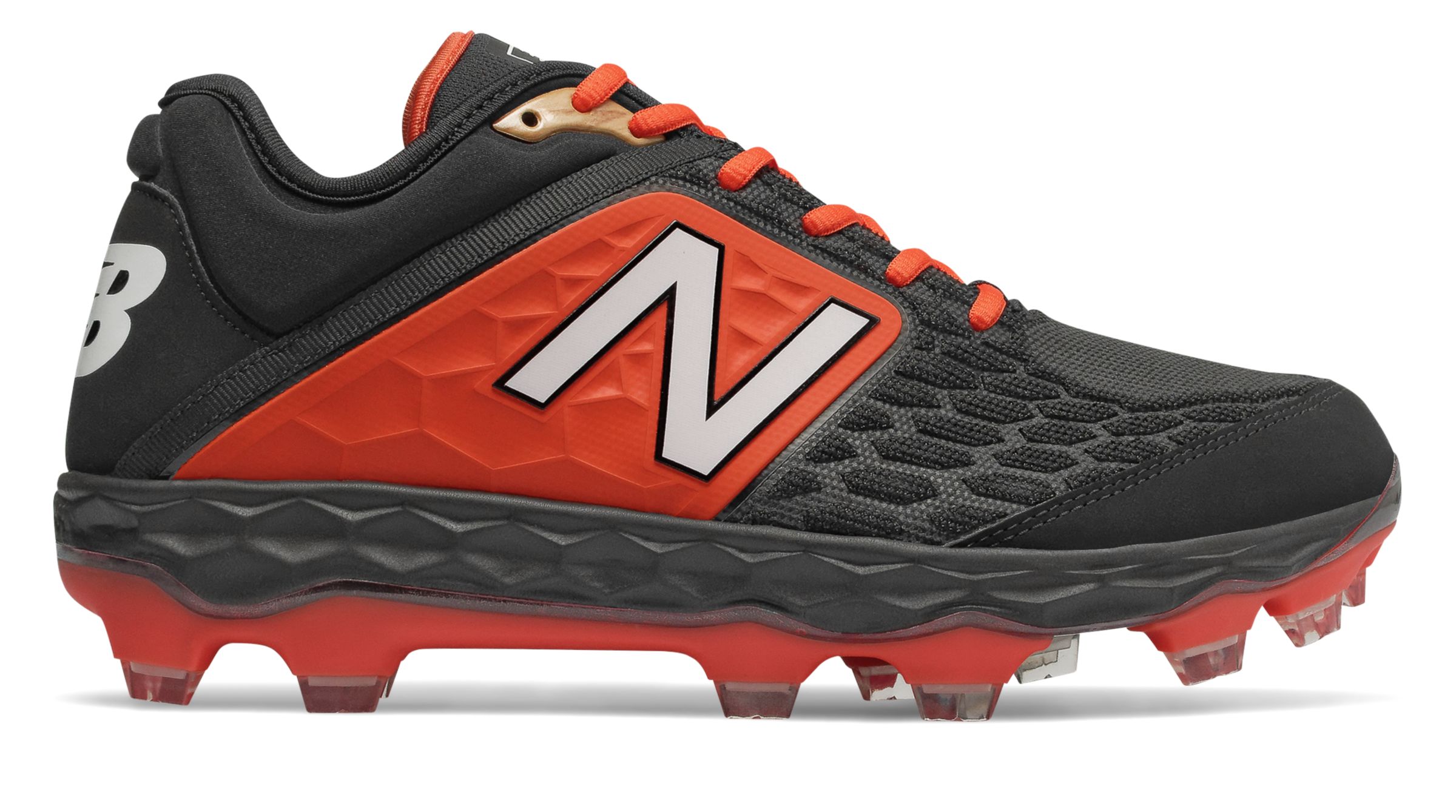 orange and black new balance cleats