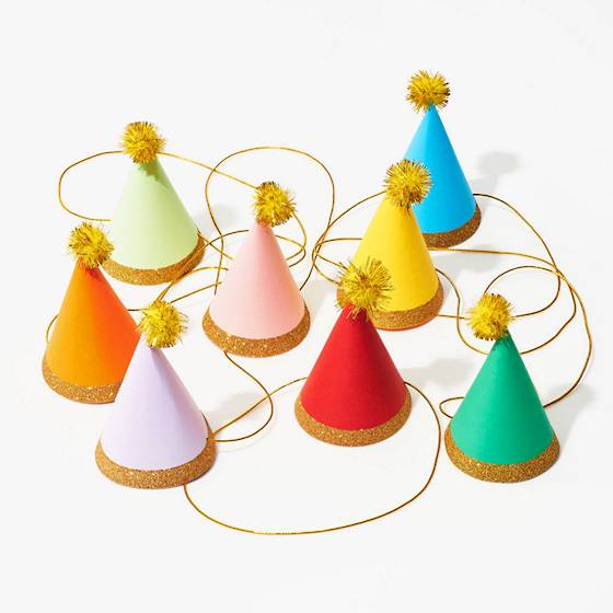 Colorful mini pom party hats.