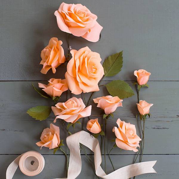 Lovely roses crepe paper flower displayed with ribbon.