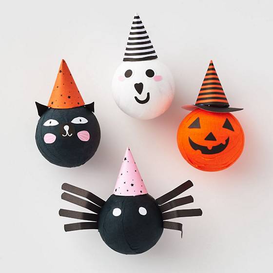 Surprise balls feature a cat, ghost, spider and pumpkin with treats in each.