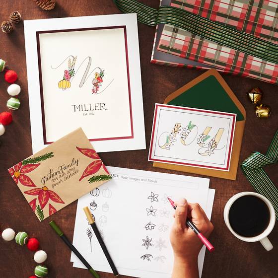 Beautifully decorated envelopes and art prints with holiday accents.
