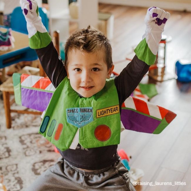 Child with Buzz Lightyear costume on