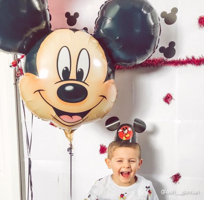 Child with Mickey balloon 