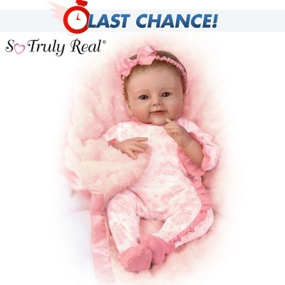 baby doll with blanket