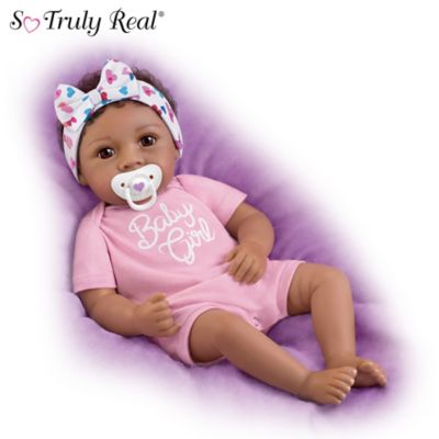 baby doll with magnetic pacifier