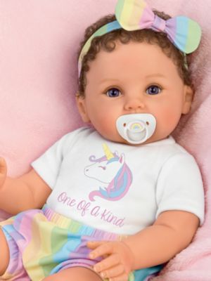 Custom rainbow outfit features bow, bloomers, and a 'one-of-a-kind' top
