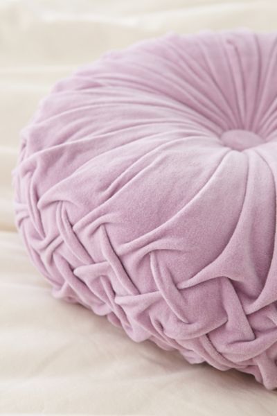 round purple throw pillow