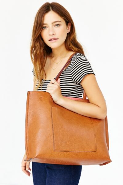 reversible faux leather tote