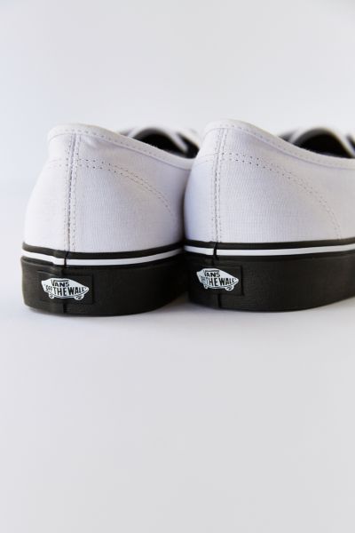 vans era black sole